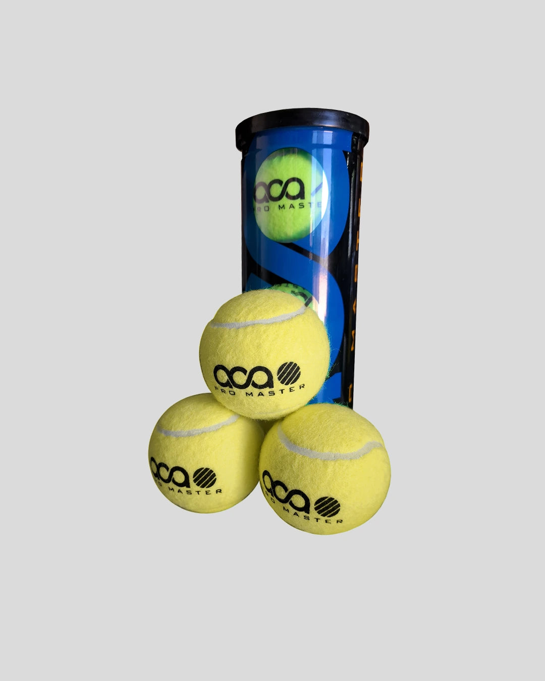 Three yellow tennis balls with a blue canister labeled 'oca' on a light gray background