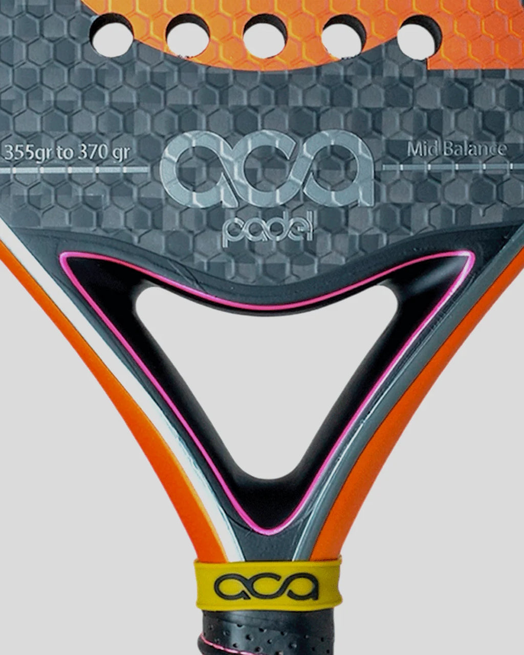 Close-up of a paddle with 'aca' branding on a gray background