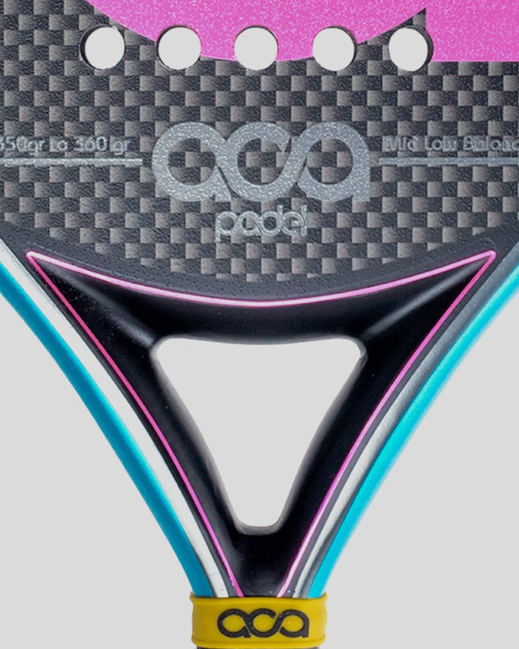 Close-up of a padel with 'ACA Padel' branding on a gray background